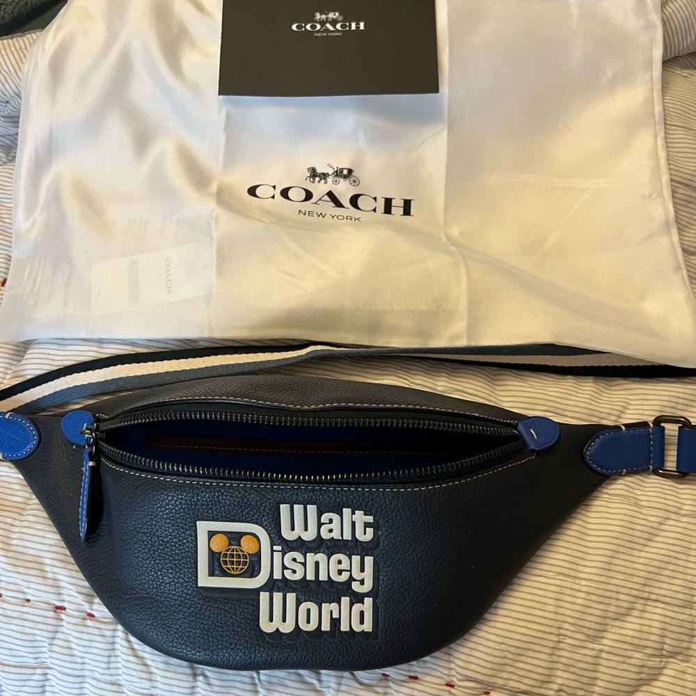 Disney Coach New without tags navy blue belt bag with a dust bag